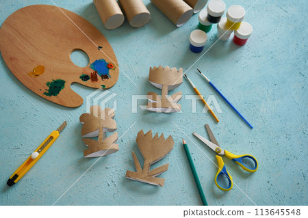 Kids craft flowers out of recycling toilet paper roll, zero waste concept. Step by step tutorial - 3. Kids craft flowers out of recycling toilet paper roll, zero waste concept. Step by step tutorial - 3. 113645548