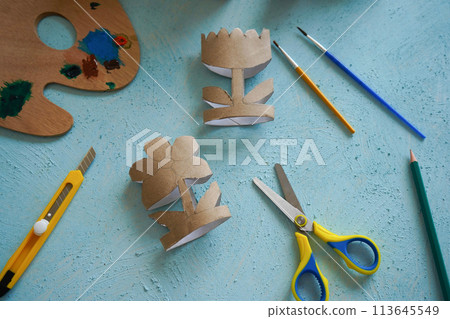 Kids craft flowers out of recycling toilet paper roll, zero waste concept. Step by step tutorial - 3. Kids craft flowers out of recycling toilet paper roll, zero waste concept. Step by step tutorial - 3. 113645549
