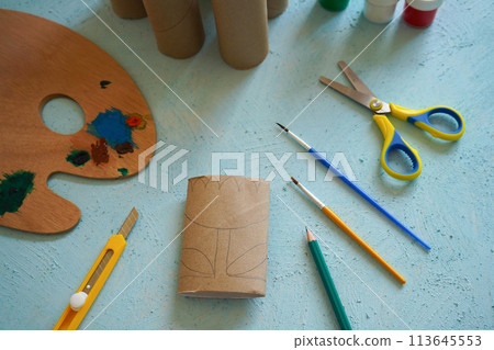 Kids craft flowers out of recycling toilet paper roll, zero waste concept. Step by step tutorial - 2. Kids craft flowers out of recycling toilet paper roll, zero waste concept. Step by step tutorial - 2. 113645553