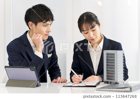 Business people having a meeting about a commercial building 113647268