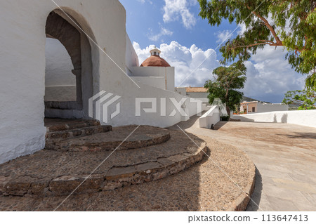 Captivating Puig de Missa in Santa Eulalia, Ibiza featuring circular stone steps and terracotta dome 113647413