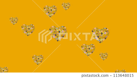 Image of flower hearts moving in hypnotic motion with copy space on orange background 113648015