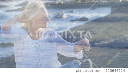 Image of sea landscape over disabled caucasian woman with artificial leg 113648214