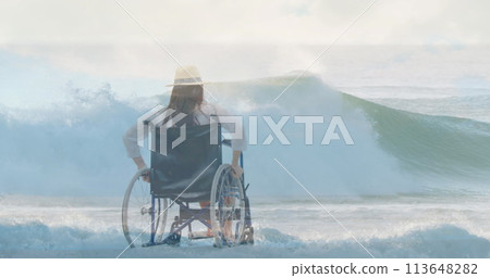 Image of sea landscape over disabled cuacasian woman sitting in wheelchair 113648282