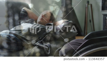 Image of light spots over disabled cuacasian man lying in bed 113648357