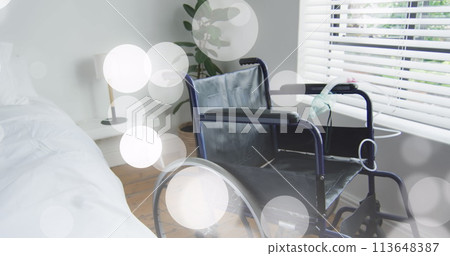 Image of spots over wheelchair 113648387