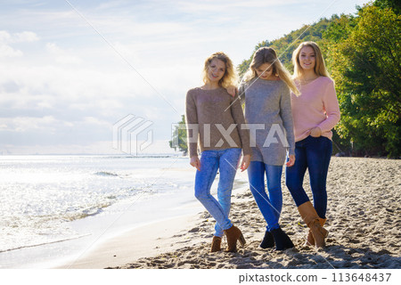 Three fashionable models outdoor 113648437