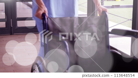 Image of spots over wheelchair Image of spots over wheelchair 113648554