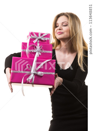 Girl holding stack of pink gift boxes 113648851