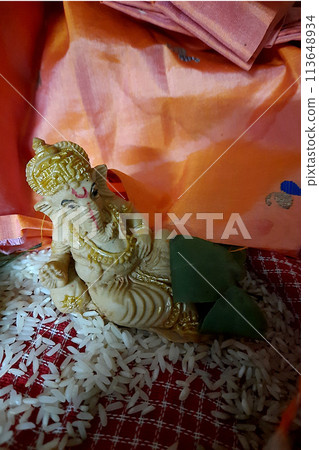 Puja of Reclining Ganesha Idol Puja of Reclining Ganesha Idol 113648934