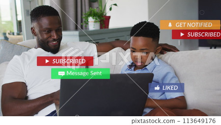 Image of subscribe over happy african american father and son using laptop Image of subscribe over happy african american father and son using laptop 113649176