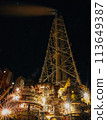 Radio tower illuminated at night 113649387
