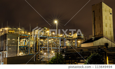 Factory night view, night view of a factory seen from a chimney 113649494