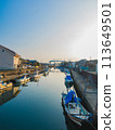 Fishing port with fishing boats in the early morning 113649501