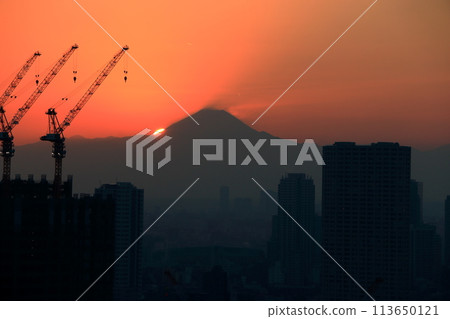 Sunset behind Mt. Fuji as seen from Minato-ku in central Tokyo Japan 113650121