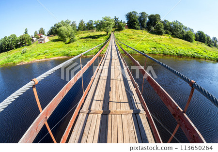 Suspension bridge across the Msta river next the Borovichi, Russia Suspension bridge across the Msta river next the Borovichi, Russia 113650264