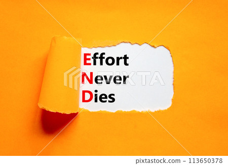 END effort never dies symbol. Concept words END effort never dies on beautiful white paper. Beautiful orange paper background. Business END effort never dies concept. Copy space. 113650378
