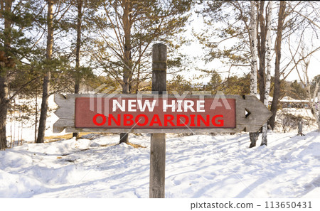 New hire onboarding symbol. Concept words New hire onboarding on beautiful wooden road sign. Beautiful forest snow blue sky background. Business new hire onboarding concept. Copy space. New hire onboarding symbol. Concept words New hire onboarding on beautiful wooden road sign. Beautiful forest snow blue sky background. Business new hire onboarding concept. Copy space. 113650431
