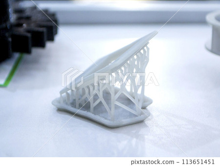 3D printed object from resin polymerization. Parts created on 3D printer from hardened resin. Details printed on 3D printer using SLA printing technology. New modern additive 3D printing technologies 113651451