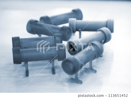 3D printed object from resin polymerization. Parts created on 3D printer from hardened resin. Details printed on 3D printer using SLA printing technology. New modern additive 3D printing technologies 113651452