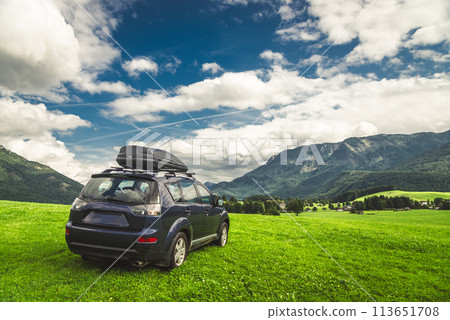 car for traveling with a mountain road 113651708