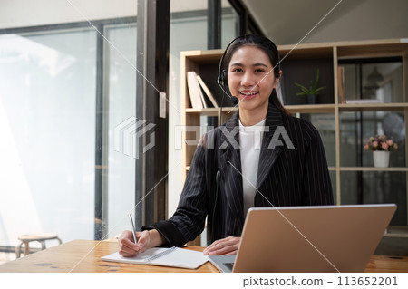Call center friendly woman asian in office for customer service, technical support and advice, contact and communication with employee operator in help desk agency Call center friendly woman asian in office for customer service, technical support and advice, contact and communication with employee operator in help desk agency 113652201