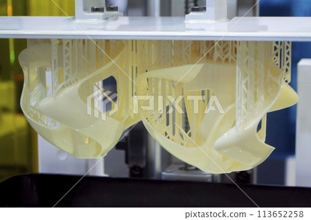 Process SLA 3D printing. Process printing on 3D printer by SLA printing technology. 3D printed object from resin polymerization. Object created on 3D printer from hardened resin. Printing technology 113652258