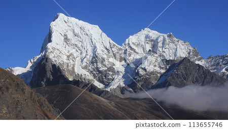 Snow covered mountains Cholatse and Tobuch, view from the Gokyo Valley, Nepal. 113655746