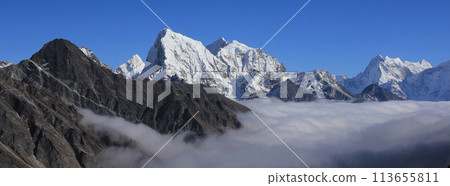 Sea of fog and peaks of Ama Dablam, Cholatse and Tobuche. 113655811