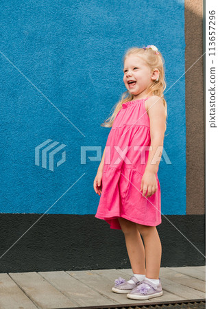 Child walks with cochlear implant system. Installation cochlear implant on child girl ear for restores hearing. Kid hears after hear return to normal. Diversity inclusion concept. 113657296