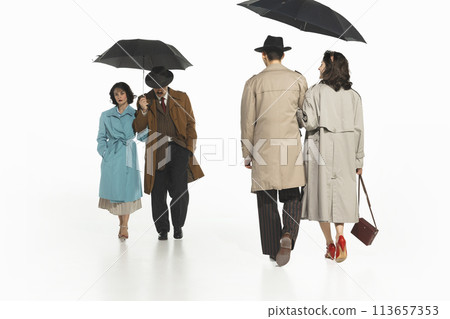 Happiness and sadness. Two couple with opposite feelings, one happy, other sad walking under umbrella. Happiness and sadness. Two couple with opposite feelings, one happy, other sad walking under umbrella. 113657353