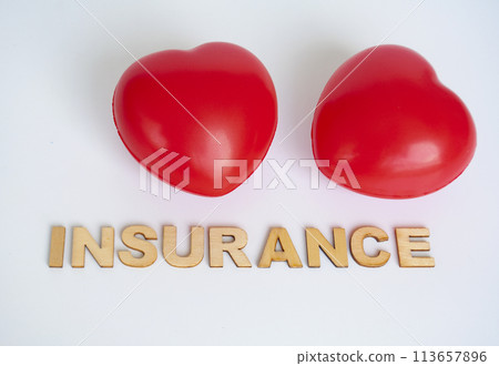 Heart shapes with insurance text on white background. Life insurance concept Heart shapes with insurance text on white background. Life insurance concept 113657896