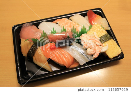 sushi bought at the supermarket 113657929