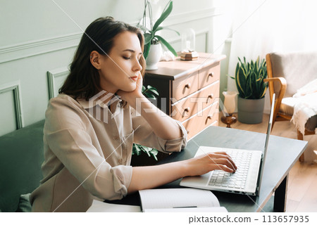 Health Struggles of Modern Work. Tired Woman Facing Stress with Laptop. Overwhelmed. Exhausted Woman Health Struggles of Modern Work. Tired Woman Facing Stress with Laptop. Overwhelmed. Exhausted Woman 113657935