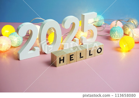 Hello 2025 word alphabet letters on pink and blue background Hello 2025 word alphabet letters on pink and blue background 113658080
