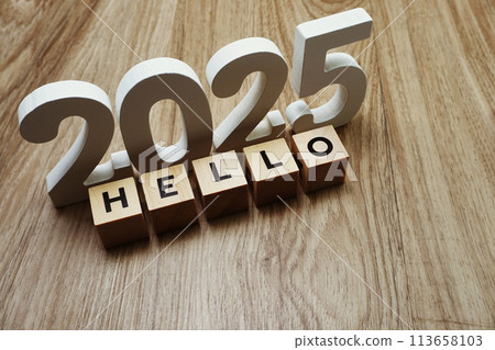 Hello 2025 word alphabet letters on wooden background 113658103