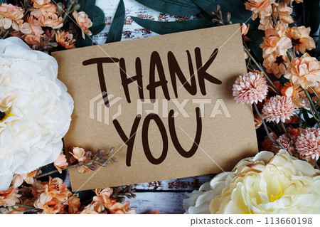 Thank You typography text with flower decorated on wooden background 113660198