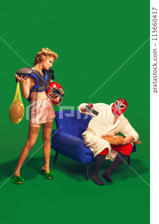 annoyed woman in Rugby uniform looking at man who looks at her with fear against vibrant green background. 113660417