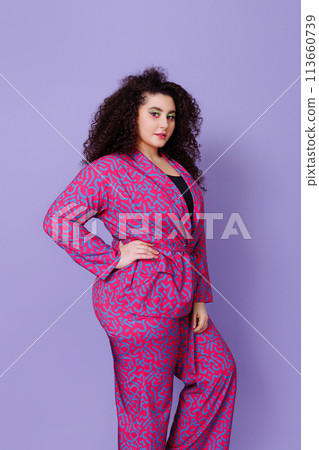 A young woman with a plus size figure with an Afro hairstyle 113660739
