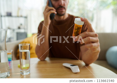 Sick man calling doctor to get medicine recommendation 113661540