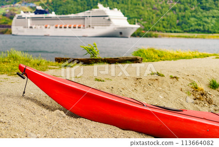 Kayak and cruise ship in Flam, Norway 113664082