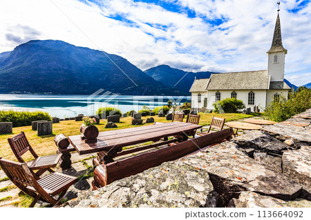 Churchyard in Nes village at fjord, Norway Churchyard in Nes village at fjord, Norway 113664092