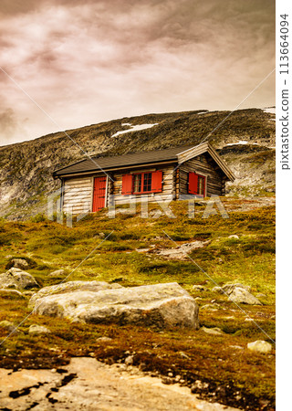 Norwegian old country houses in mountains. Norwegian old country houses in mountains. 113664094
