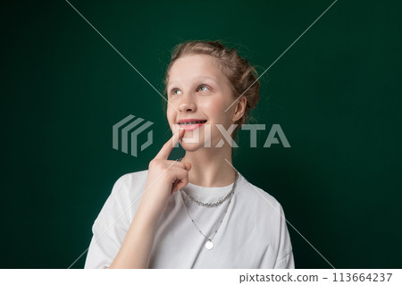 Woman Posing for Picture With Finger on Lips 113664237