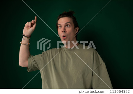 Man Making Funny Face With Finger Man Making Funny Face With Finger 113664532