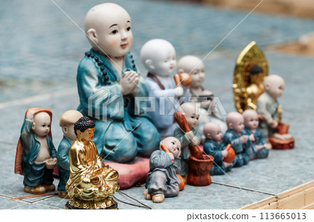 Little Buddha miniature statues at the entrance to Gumyeongsa Temple 113665013