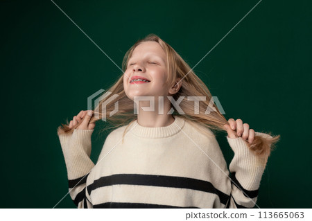 Smiling Young Girl With Blonde Hair Smiling Young Girl With Blonde Hair 113665063