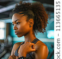 Portrait of a young black woman using a sport smartwatch 113665135