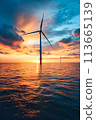 Offshore wind farm at beautiful dramatic sunset. 113665139