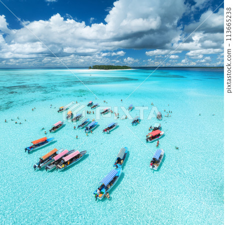 Aerial view of colorful boats, sandbank, blue sea on sunny day Aerial view of colorful boats, sandbank, blue sea on sunny day 113665238
